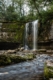 Camping-car dans le Jura : cascade du Hérisson au coeur de la forêt
